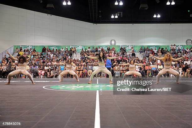 Dancers perform during the dance competition sponsored by King.com during the 2015 BET Experience at the Los Angeles Convention Center on June 27,...