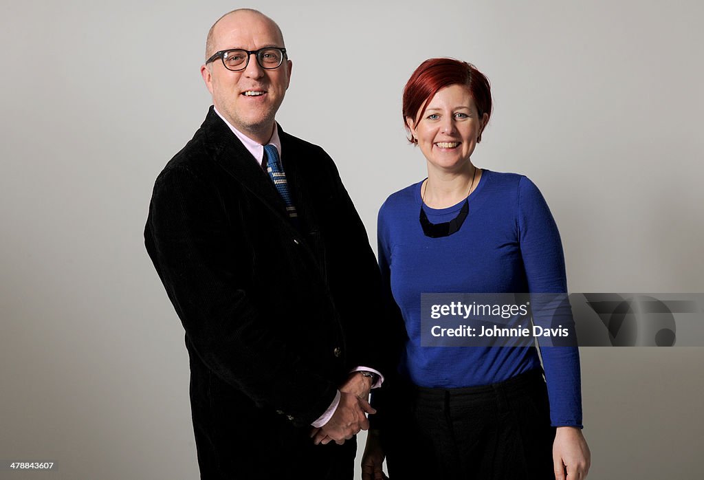 A smart mature couple on white background