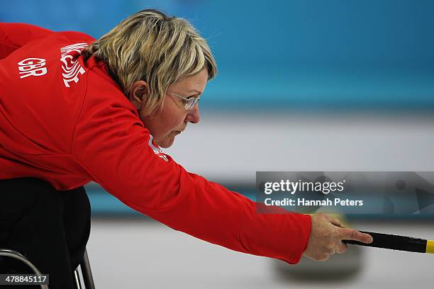 Angie Malone of Great Britain plays a shot during the bronze medal match between China and Great Britain on day eight of Sochi 2014 Paralympic Winter...