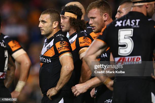 Robbie Farah of the Wests Tigers looks dejected after a Panthers try during the round 16 NRL match between the Wests Tigers and the Penrith Panthers...