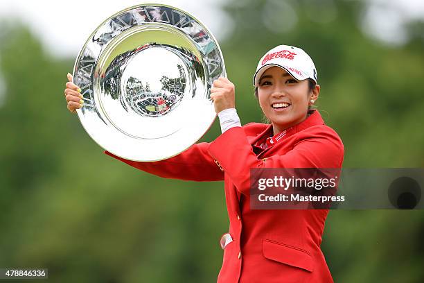 Bo-Mee Lee of South Korea poses with the trophy after winning the Earth Mondamin Cup at the Camellia Hills Country Club on June 28, 2015 in...