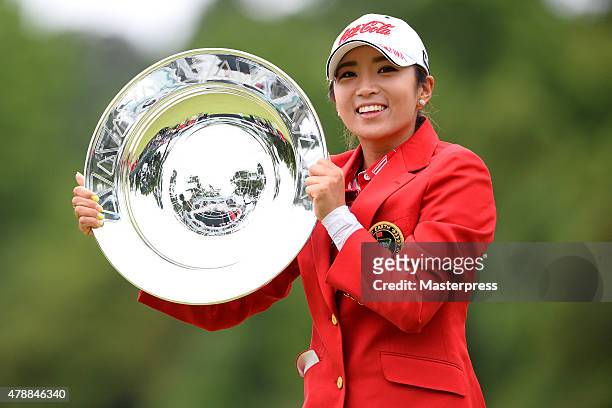 Bo-Mee Lee of South Korea poses with the trophy after winning the Earth Mondamin Cup at the Camellia Hills Country Club on June 28, 2015 in...