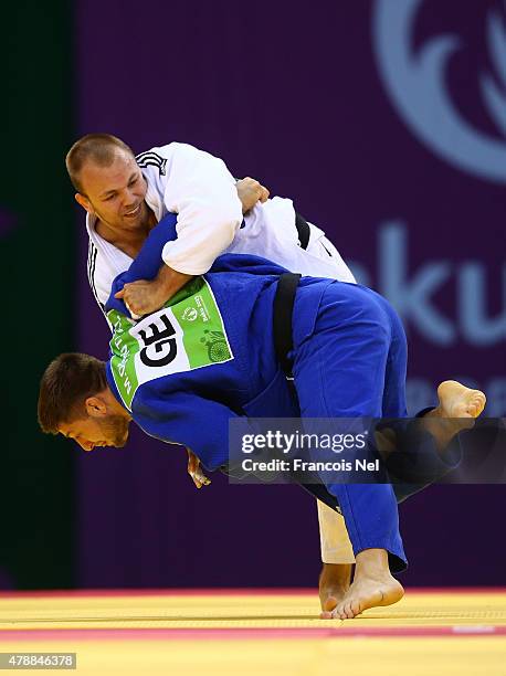 Alexandr Jurecka of the Czech Republic and Marc Odenthal of Germany compete in the Men's Judo Team Repechage during day sixteen of the Baku 2015...