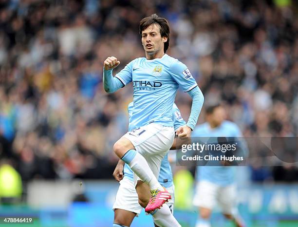 David Silva of Manchester City celebrates after he scores the first goal of the game for his side during the Barclays Premier League match between...