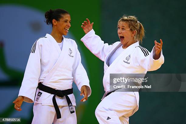 Annabelle Euranie and Laetitia Blot of France celebrate winning the gold in the Women's Team gold medal match during day sixteen of the Baku 2015...