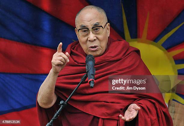 His holiness the Dalai Lama gives a talk during the third day of Glastonbury Festival at Worthy Farm, Pilton on June 28, 2015 in Glastonbury, England.