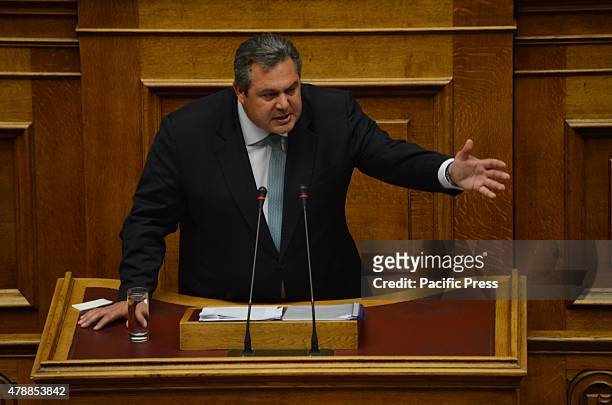 Minister of National Defense and President of the Independent Greeks political party Panos Kamenos talks to the Greek parliament. Greek lawmakers...