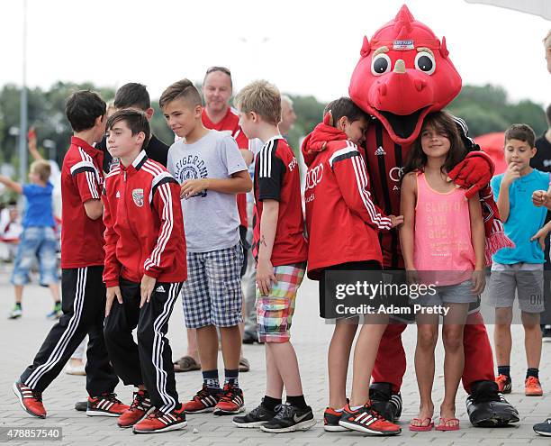 Young FC Ingolstadt fans enjoy the activities on the first day of training at Audi Sportpark on June 28, 2015 in Ingolstadt, Germany.