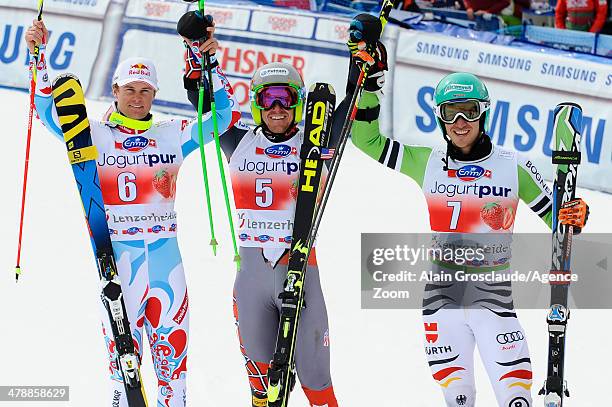 Ted Ligety of the USA takes 1st place and wins the overall giant slalom World Cup globe, Alexis Pinturault of France takes 2nd place and is third in...