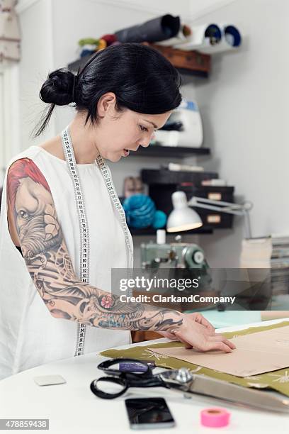 professional dressmaker at work - mannequin arm stock pictures, royalty-free photos & images