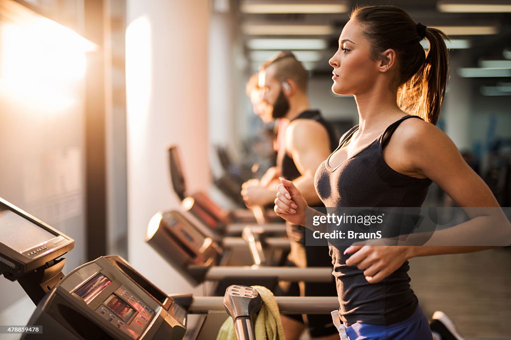 People Using Treadmill People Running On A Treadmill In Health Club High-Res Stock Photo ...