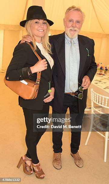 Sarina Potgieter and Roger Taylor attend the Carter Style & Luxury Lunch at the Goodwood Festival of Speed on June 28, 2015 in Chichester, England.