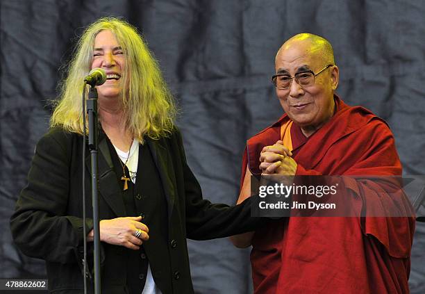 His holiness the Dalai Lama joins Patti Smith on the Pyramid stage during the third day of Glastonbury Festival at Worthy Farm, Pilton on June 28,...