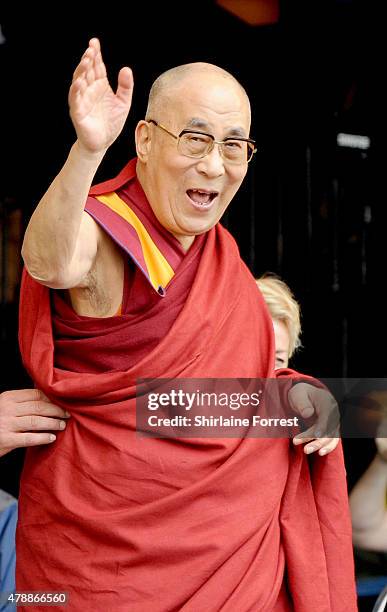 The Dalai Lama celebrates his 80th Birthday with Patti Smith on The Pyramid Stage at the Glastonbury Festival at Worthy Farm, Pilton on June 28, 2015...