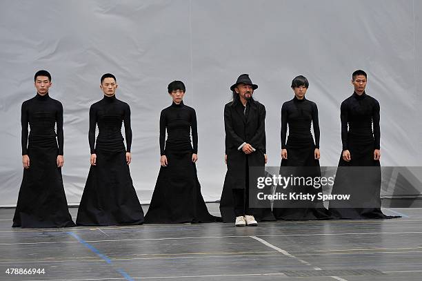 Yohji Yamamoto acknowledges the audience during the Y3 Menswear Spring/Summer 2016 show as part of Paris Fashion Week on June 28, 2015 in Paris,...