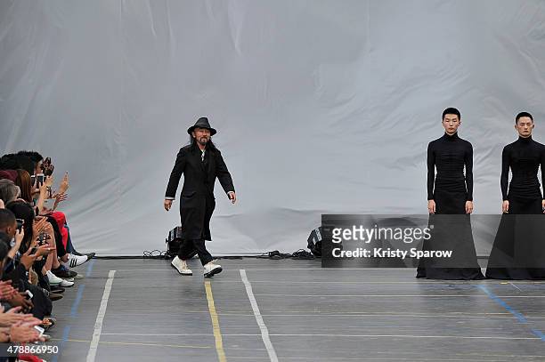 Yohji Yamamoto acknowledges the audience during the Y3 Menswear Spring/Summer 2016 show as part of Paris Fashion Week on June 28, 2015 in Paris,...