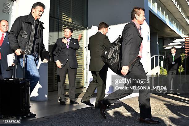 Brazil's national team coach Dunga leaves the hotel in Concepcion, Chile, on June 28 a day after crashing out of the Copa America in a quarter-final...