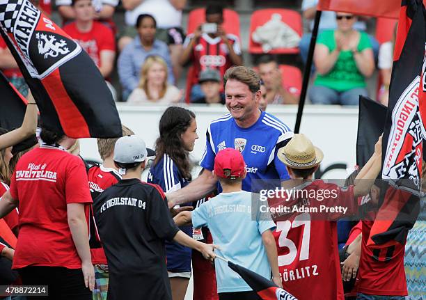 Ralph Hasenhuettl Head Coach of FC Ingolstadt is greeted by the fans during first day of training at Audi Sportpark on June 28, 2015 in Ingolstadt,...