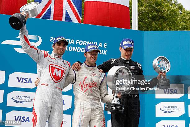 Sam Bird , Jerome d'Ambrosio and Loic Duval celebrate on the podium at Battersea Park Track on June 28, 2015 in London, England.