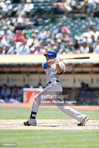 Kyle Blanks of the Texas Rangers bats during the game against the Oakland Athletics at O.co Coliseum on June 11, 2015 in Oakland, California. The...