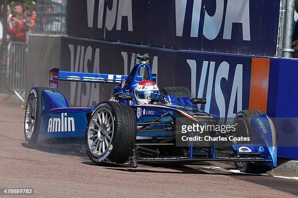 Sakon Yamamoto of Japan crashes out becoming the first retirement of the Formula E race at Battersea Park Track on June 28, 2015 in London, England.