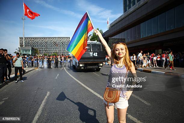 Police take security measures during a LGBT parade on June 28, 2015 in Taksim region of Istanbul, Turkey.