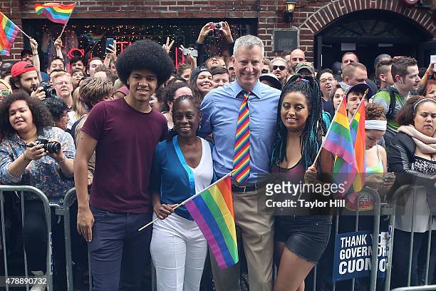 New York City Mayor Bill de Blasio, his wife, Chirlane McCray, and his children, Dante de Blasio and Chiara de Blasio march in the 2015 NYC Pride...