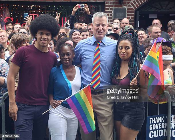 New York City Mayor Bill de Blasio, his wife, Chirlane McCray, and his children, Dante de Blasio and Chiara de Blasio march in the 2015 NYC Pride...