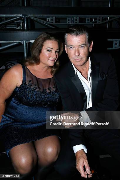 Actor Pierce Brosnan with his wife Journalist Keely Shaye Smith attend the Saint Laurent Menswear Spring/Summer 2016 show as part of Paris Fashion...