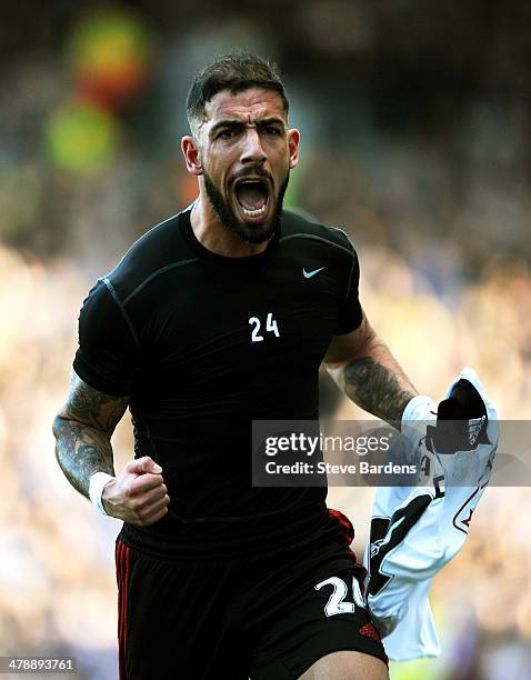 Ashkan Dejagah of Fulham celkebrates after scoring the opening goal during the Barclays Premier league match between Fulham and Newcastle United at...