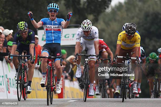 Tom Jelte Slagter of Holland and Garmin Sharp celebrates victory from Rui Costa of Portugal and Lampre Merida and yellow jersey race leader Carlos...