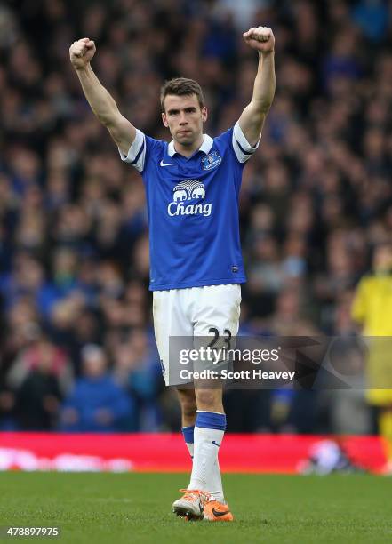 Seamus Coleman of Everton celebrates scoring the winning goal during the Barclays Premier League match between Everton and Cardiff City at Goodison...