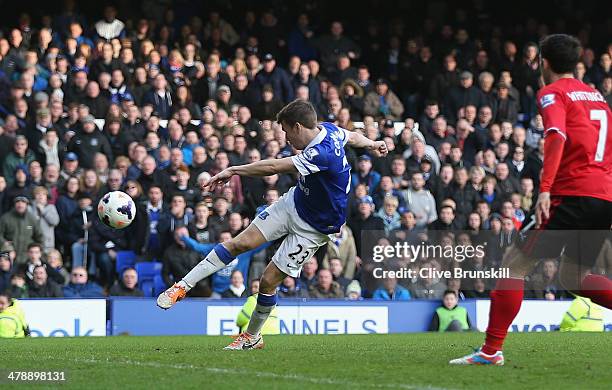 Seamus Coleman of Everton scores the winning goal during the Barclays Premier League match between Everton and Cardiff City at Goodison Park on March...