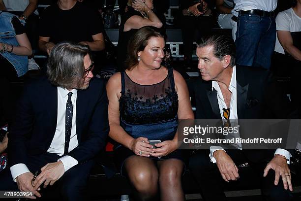 Actor Gary Oldman, Actor Pierce Brosnan and his wife Journalist Keely Shaye Smith attend the Saint Laurent Menswear Spring/Summer 2016 show as part...