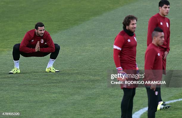 Peru's forward Claudio Pizarro and teammates take part in a training session at the National Stadium in Santiago on June 28 during the Copa America...