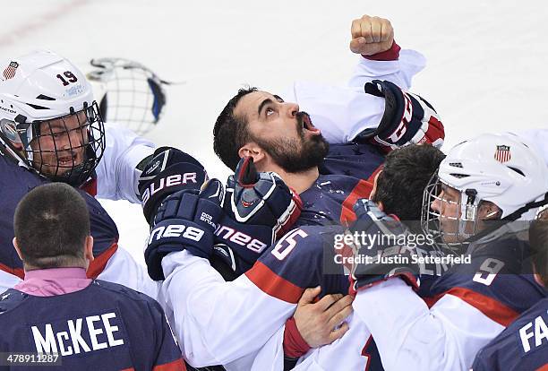 Steve Cash of the United States celebrates after USA win the ice sledge hockey gold medal game against the Russian Federation and the United States...