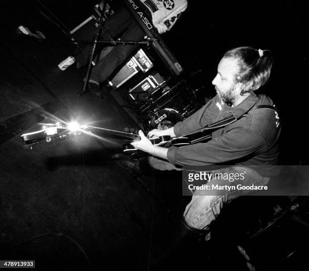 Peter Hook, performs on stage during a tour with his band Revenge, United Kingdom, 1990.