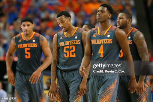 Jarnell Stokes, Jordan McRae, Armani Moore, and Jeronne Maymon of the Tennessee Volunteers after a technical foul called against Maymon during the...