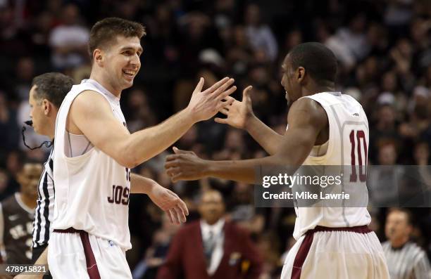 Halil Kanacevic and Langston Galloway of the Saint Joseph's Hawks celebrate after a play in the second half against the St. Bonaventure Bonnies...