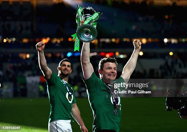 Brian O'Driscoll of Ireland celebrates with the trophy after winning the six nations championship with a 22-20 victory over France during the RBS Six...