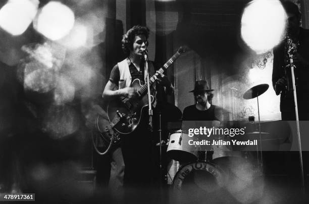 Joe Strummer and Richard 'Snakehips' Dudanski perfoming with English pub rock group The 101ers at The Elgin pub, Ladbroke Grove, London, 1975....