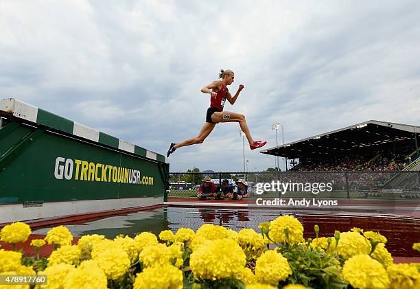 Evan Jager clears the water barrier on the way to victory in the Mens 3,000 Meter Steeplechase during day four of the 2015 USA Outdoor Track & Field...
