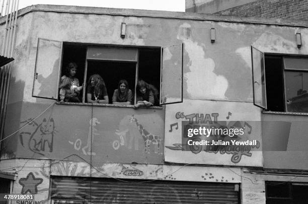 Squatters at 'That Petrol Garage', a former black cab refuelling forecourt on Woodfield Road, Maida Vale, London, where four hundred people joined...