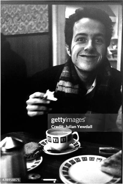 Singer-songwriter Joe Strummer of English pub rock group The 101ers, in a cafe on Chippenham Road, near the band's squat at 101 Walterton Road,...