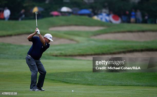 Carl Pettersson of Sweden hits his second shot on the sixth hole during the final round of the Travelers Championship held at TPC River Highlands on...