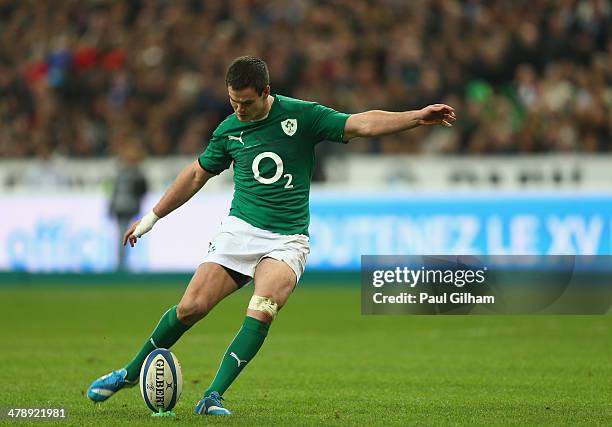 Jonny Sexton of Ireland kicks a conversion during the RBS Six Nations match between France and Ireland at Stade de France on March 15, 2014 in Paris,...