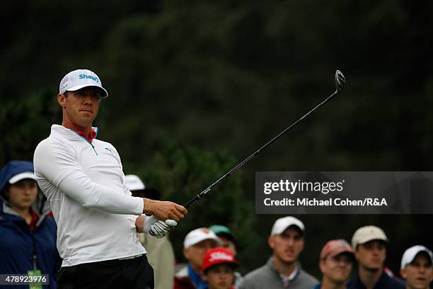 Graham Delaet of Canada hits his drive on the fifth hole from a bunker during the final round of the Travelers Championship held at TPC River...