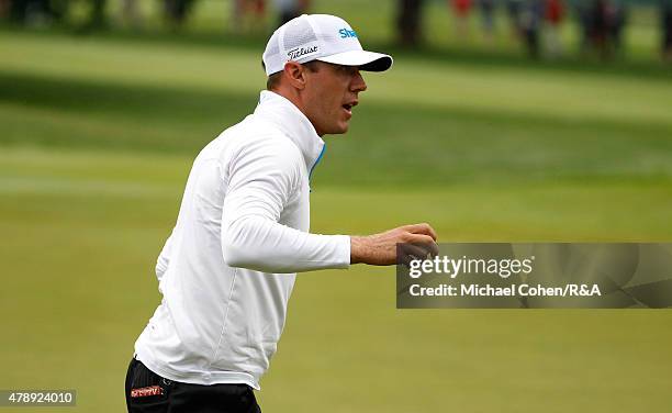 Graham Delaet of Canada acknowledges the gallery on the fifth green during the final round of the Travelers Championship held at TPC River Highlands...