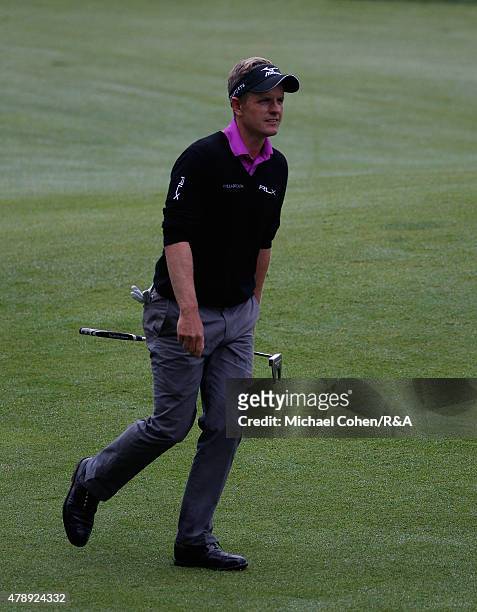 Luke Donald of England walks on the 18th fairway during the final round of the Travelers Championship held at TPC River Highlands on June 28, 2015 in...