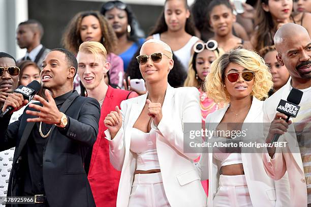 Host Terrence J, rapper Machine Gun Kelly, model Amber Rose and model Blac Chyna attend the BET Awards pre-show during the 2015 BET Awards at the...